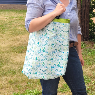 Shop in style with this classy 100% Cotton Tote Bags. Great for heading to the library, yoga, shopping, or to keep your projects contained.  Size: 16" wide x 17" long x 4" gusseted bottom Materials: 100% cotton with cotton liner and webbing. USA Made in Washburn, Wisconsin