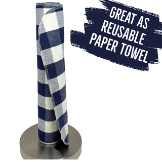 A set of four navy/blue and white gingham cloth napkins, made from 100% yarn-dyed flannel cotton, each measuring 14 by 14 inches.