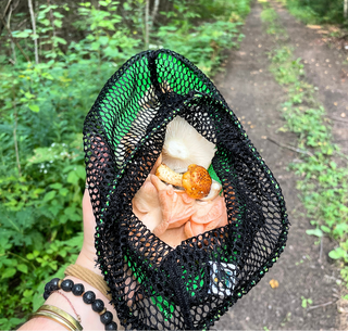This drawstring mesh bag is the perfect accessory for all your nature walks, whether you're beachcombing or hiking in the woods. Great for rock hunting, foraging, beach glass collecting, sea shells, pinecones, and as a beachcomber tote. Drawstring, toggle closure with durable mesh and a fine weave bottom to keep your treasures in but let sand out. Main body mesh is made using eco-friendly remnant fabric. Made in Wisconsin, USA
