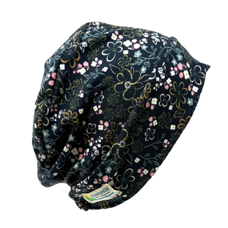 Soft chemotherapy hat made from stretchy fabric. Palliative care hat designed for hair loss comfort. Locally made chemo hat from AdventureUs in Washburn, WI