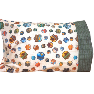 This pillowcase is a perfect gift for the National Parks enthusiast in your life.  Standard Size measures 30" x 20" One pillowcase Washing Instructions: Machine Wash Cold/Tumble Dry Low Product designed and sewn by AdventureUs in Northern Wisconsin  Materials: 100% cotton Riley Blake Designs™ National Parks Badges fabric