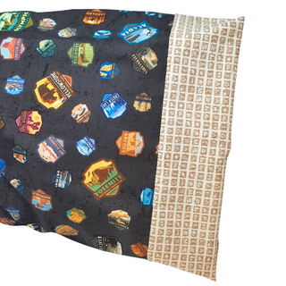 This pillowcase is a perfect gift for the National Parks enthusiast in your life. Standard Size measures 30" x 20" One pillowcase Washing Instructions: Machine Wash Cold/Tumble Dry Low Product designed and sewn by AdventureUs in Northern Wisconsin Materials: 100% cotton Riley Blake Designs™ National Parks Badges fabric