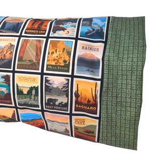 This pillowcase is perfect for the National Parks enthusiast in your life.  Standard Size measures 30" x 20" One pillowcase Choose from cream or green cuff Washing Instructions: Machine Wash Cold/Tumble Dry Low Product designed and sewn by AdventureUs 2022 in Northern Wisconsin  Materials: 100% cotton Riley Blake Designs™ National Parks Posters fabric