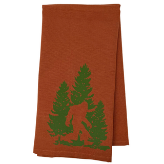 One 28" x 20" burnt orange colored towel
6" x 4.5" design of an elusive Sasquatch and fir tree
Proudly designed and printed in Washburn, WI, USA