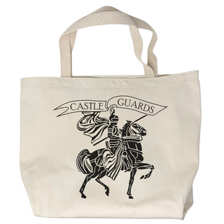 USA-Made in Washburn, Wisconsin with 100% cotton canvas. This unique tote bag features a fun graphic designed in-house. Perfect for carrying your essentials on any adventure! Features black sideview  image of a knight on a horse carrying a banner that reads Castle Guards.