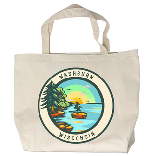 USA-Made in Washburn, Wisconsin with 100% cotton canvas. This unique tote bag features a fun graphic designed in-house. Perfect for carrying your essentials on any adventure! Features a circle logo with a rocky shoreline and sunrise over the water bracketed by the words Washburn Wisconsin.