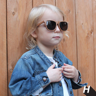 Features:
• Polarized, UV-protective lenses for maximum sun safety
• Flexible, kid-tough frames built to last
• Adjustable stay-on strap keeps sunglasses securely in place
• Available in a range of bold, trendy colors to suit every personality