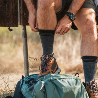Fox River Backcountry lightweight hiking socks in neutral tones, featuring reinforced heel and toe, ribbed arch support, and breathable mesh panels—ideal for outdoor adventures.