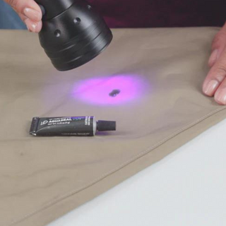 Repair your gear in a snap with Gear Aid's easy to use products. Ideal for Repairs dry suit, rainwear, waders, dry bags, neoprene, and more. Adhesive. Instant and Fast. Flexible. Waterproof. Abrasion Resistant. Dries Clear. USA Made. Easily use a UV Flashlight to instantly cure repairs.
