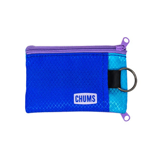 Crafted from durable ripstop material and packed with thoughtful features like dual zippered pockets, a clear ID window, and a key ring attachment, it keeps your essentials secure and accessible. Bonus: it includes an RFID-blocking card for added peace of mind.