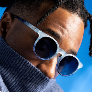 That Literal Drip. Limited-edition sunglasses with translucent light blue frames, a deep whirlpool design &amp; polarized gradient lenses.&nbsp;

These amazing shades are the real deal. Super-stylish &amp; perfect for all your adventures!&nbsp; Be the envy of your friends this summer season!&nbsp;

Great sunglasses for kids (~7 years &amp; up) and adults.

POLARIZED: Glare reducing, polarized lenses with UV400 protection against UVA/UVB rays
NO Slip: Special grip coating eliminates slippage while sweating
