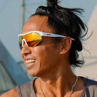 POLARIZED: Glare reducing, polarized lenses with UV400 protection against UVA/UVB rays
NO Slip: Special grip coating eliminates slippage while sweating
NO Bounce: Snug and lightweight frame with a comfortable fit to prevent bouncing during high-impact sports
Adjustable nose piece and a ventilated wrap lens for lightning-in-a-bottle athletes.
Goodr is also a Member of 1% for the Planet