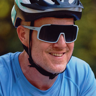 Semi-rimless, blue shield frames. Polarized gradient lenses reduce glare from the sun shining on your kidnapper's metallic exoskeleton. Won't slip or bounce while you desperately try to escape your cyborg captors. (P.S. Resistance is futile.)