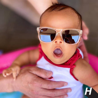 • Polarized, UV-protective lenses for maximum sun safety
• Flexible, kid-tough frames built to last
• Adjustable stay-on strap keeps sunglasses securely in place
• Available in a range of bold, trendy colors to suit every personality