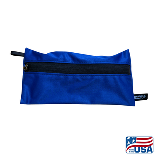 Eco-friendly, water-resistant pack bags keep messes contained and gear organized. Perfect for travel, wet swimsuits, toiletries, or hiking essentials, they make sustainable living simple and stylish. USA Made in Wisconsin. Blue color with black zipper and hang loop. Size Small 9 inches by 4.5 inches.