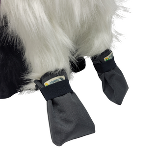 Water and abrasion resistant booties with soft elastic for a secure fit. Coruda® fabric for excellent abrasion and tear resistance. Ideal for cold, wet or snowy weather or to protect paw injuries. For extra cozy warmth, layer with our Fleece Pet Booties. Made by AdventureUs in Washburn, WI