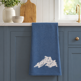 Navy Blue hand towel featuring Lake Superior draped over a counter in a modern kitchen.