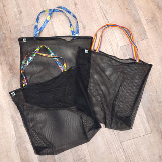 Black mesh bag with choice of colorful handles Generous size: 23" wide by 19" tall and a 3" gusseted base Eco-friendly manufacturer remnant (leftover) mesh Strong seams with nylon binding Durable, heaty-duty, shoulder length handles