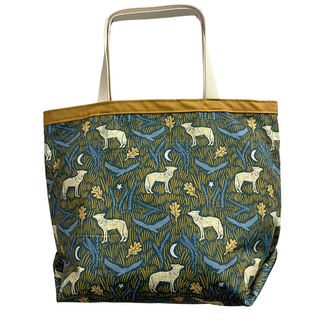 It's easy to ditch the plastic&nbsp;bag with this fun and functional classic market tote.


Great as gifts and as additions to your sustainable lifestyle.
Size: 18" wide x 13.5" tall x 6" gusseted bottom
Materials: 100% cotton with cotton liner and webbing.
Care: Easy wash and dry on normal settings