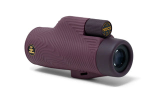 Purple monocular with 'Nocs' branding on a white background