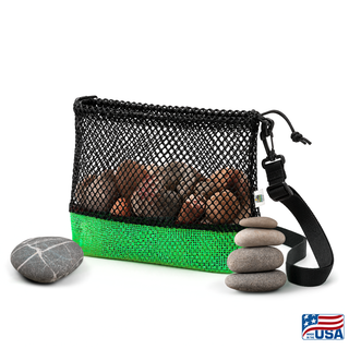 Green and Black AdventureUs mesh collecting bag with carrying strap for agate hunting, rock collecting, mushroom foraging, and beachcombing. Filled with rocks with nature items around for featured suggested use.