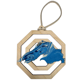 Each piece showcases unique patterns making it a one-of-a-kind addition to your holiday decor. Hang it on your tree or display it in your home to celebrate the season with a touch of nature’s artistry. Perfect as a gift or a cherished keepsake, this ornament captures the spirit of the holidays and the timeless beauty of Lake Superior.

Laser cut birch wood, measures about 3.75 in wide x 4 in tall, is strung with white leather string and packaged in a cellophane bag with backing card.&nbsp;