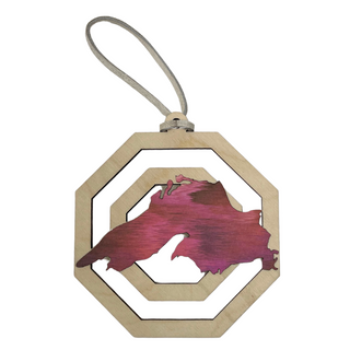 Each piece showcases unique patterns making it a one-of-a-kind addition to your holiday decor. Hang it on your tree or display it in your home to celebrate the season with a touch of nature’s artistry. Perfect as a gift or a cherished keepsake, this ornament captures the spirit of the holidays and the timeless beauty of Lake Superior.

Laser cut birch wood, measures about 3.75 in wide x 4 in tall, is strung with white leather string and packaged in a cellophane bag with backing card.&nbsp;