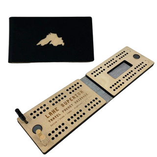 Lake Superior inspired cribbage board. 5" x 2.5" , comes complete with four pegs, a convenient magnetic clasp, and a textured black vinyl finish with a peak a boo cutout. At 5" long when closed, these boards are easy to stick in your pocket for camping trips, road trips, and outdoor events!