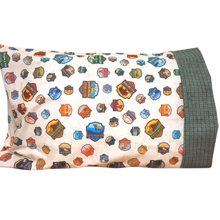 This pillowcase is a perfect gift for the National Parks enthusiast in your life.  Standard Size measures 30" x 20" One pillowcase Washing Instructions: Machine Wash Cold/Tumble Dry Low Product designed and sewn by&nbsp;AdventureUs in Northern Wisconsin  Materials: 100% cotton&nbsp;Riley Blake Designs™ National Parks Badges fabric