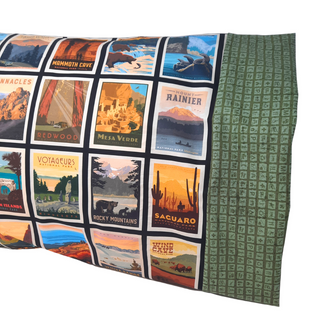 This pillowcase is perfect for the National Parks enthusiast in your life.  Standard Size measures 30" x 20" One pillowcase Choose from cream or green cuff Washing Instructions: Machine Wash Cold/Tumble Dry Low Product designed and sewn by&nbsp;AdventureUs 2022 in Northern Wisconsin  Materials: 100% cotton&nbsp;Riley Blake Designs™ National Parks Posters fabric