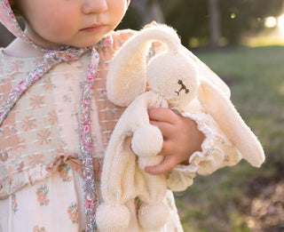 This original handmade bunny will become a beloved cozy toy for baby. The texture provides relief from sore or itchy gums due to teething, as well as encourage tactile exploration. The flat body is easy for baby to hold on to while soothing teething pains.