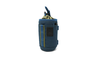 Small, versatile, and ready for more than one job, the Monocular Tube Caddy keeps your monocular protected and accessible, whether it’s slung over your shoulder, mounted to your pack, or clipped inside your car.

Featuring a drawstring cinch lid, NocLoc universal strap connectors, and rugged recycled fabric, this caddy integrates seamlessly with the NocLoc system. Bonus: it’s conveniently sized to double as a slim-can beverage holder when you’re glassing from camp or trailhead.