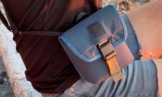 Built for longer looks and bigger glass, the Field Issue Binocular Pouch is purpose-built to protect your Field Issue 32mm Binoculars while staying flexible enough for everyday carry and travel.

Made from rugged recycled fabric, this pouch features NocLoc universal strap connectors, a secure closure, and an internal pocket for field notes. Whether worn cross-body, slung over a shoulder, or mounted to your pack or bike, it integrates seamlessly into the NocLoc carry system.
